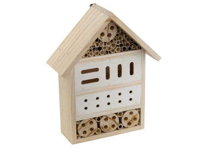 Insect hotel made of pine wood, straw and bamboo